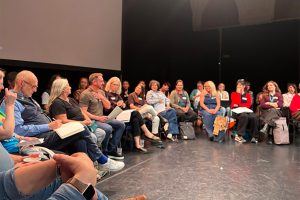 People sat in event talking